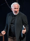 Simon Callow clutching book