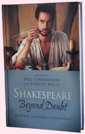 The cover of Shakespeare Beyond Doubt, showing Joseph Fiennes as Shakespeare with a quill pen, a still from the movie Shakespeare in Love.