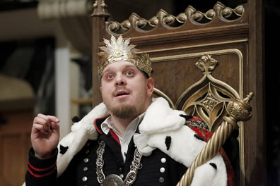 Richard III, sitting on a throne, crowned, with ermine cape, medallion, and scepter