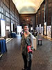 Sarah, gorgeous as ever, stands in the middle of the Folger's Great Hall. Her "brain" is a red Washington Nationals purse hanging over her shoulder down to her waist.