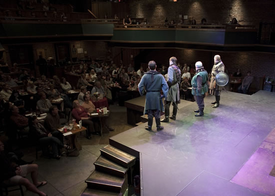 Macbeth on the New American Shakespeare Tavern stage, with a view of the audience at tables